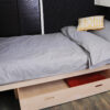 Everything Goes - Bow Bed (made up as bed on narrowboat) with large storage drawer underneath